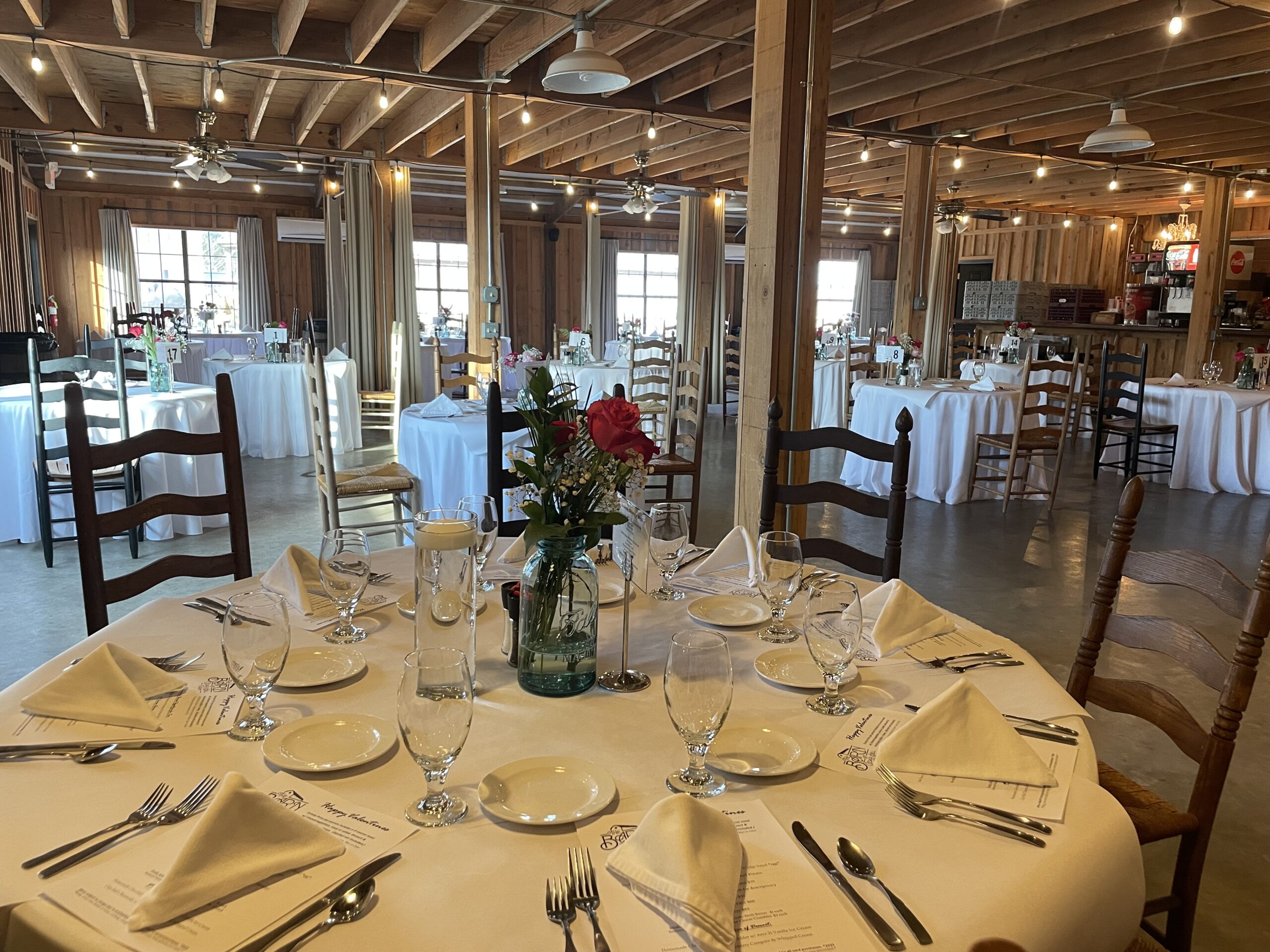 Group enjoying a private event in The Barn