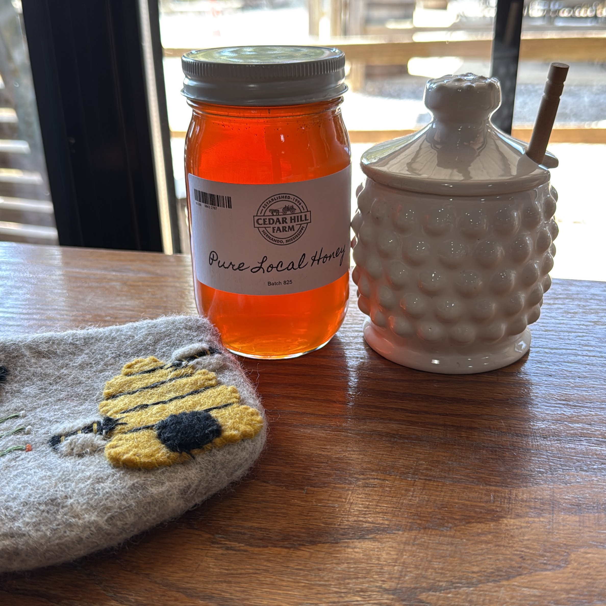 Jars of pure, raw local honey from Cedar Hill Farm